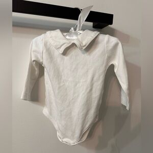 Charming Mary bib onsie. 6-9months.